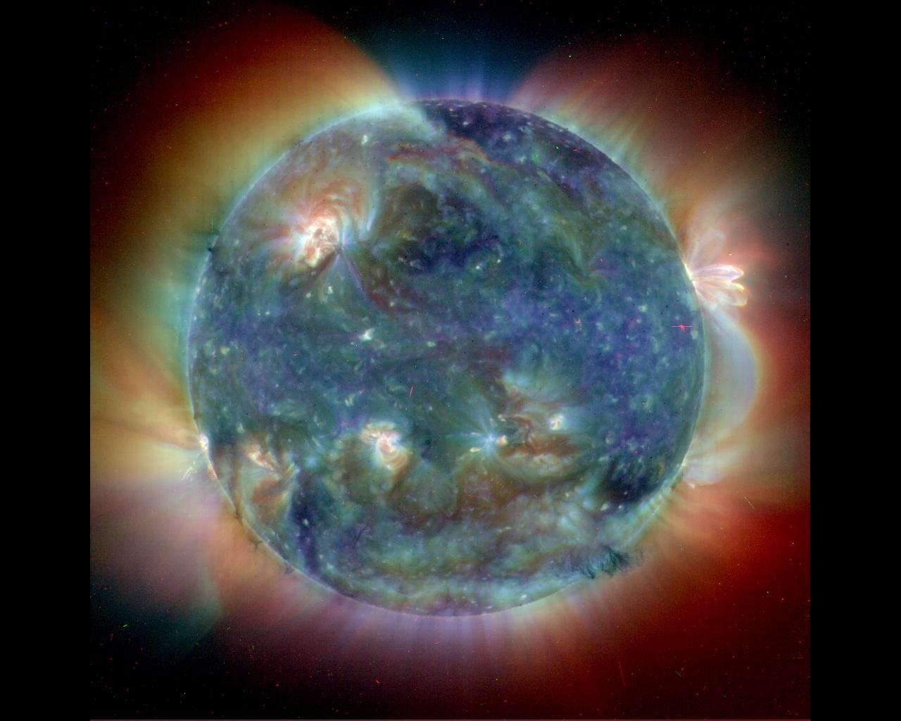 Sun from EIT instrument on SOHO observatory wallpaper