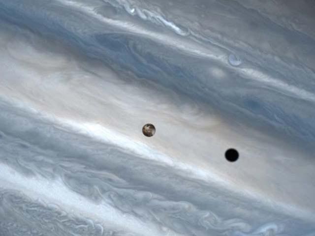 Io's shadow on Jupiter wallpaper