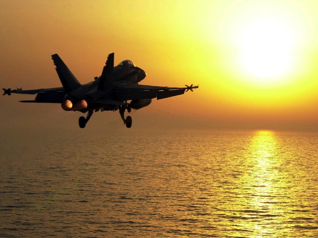 F-18 going into the sun wallpaper