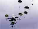 Paratroopers drop from C-17 Globemaster