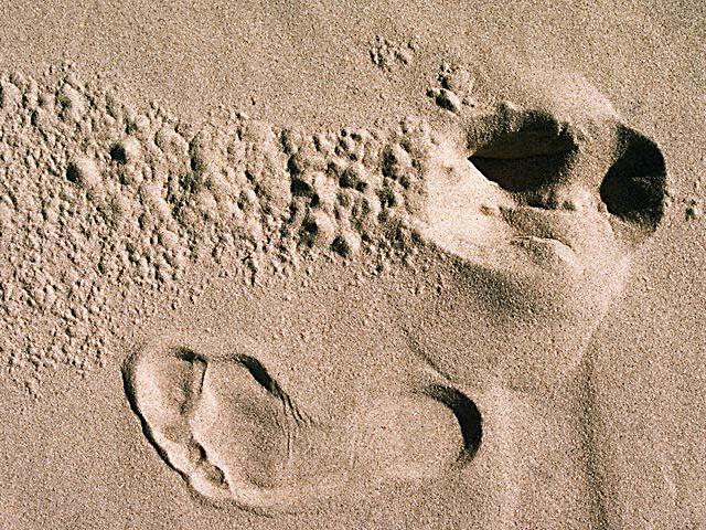 Footprints in sand wallpaper
