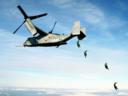 U.S. Marine Corps parachutists free fall<br />from an MV-22 Osprey at 10,000 feet